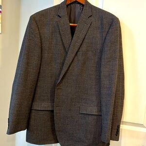 Double vented brown blazer w/ blue and gray pinpoints. 48L.Excellent condition.